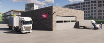 vu garage sncf avec des camions devant